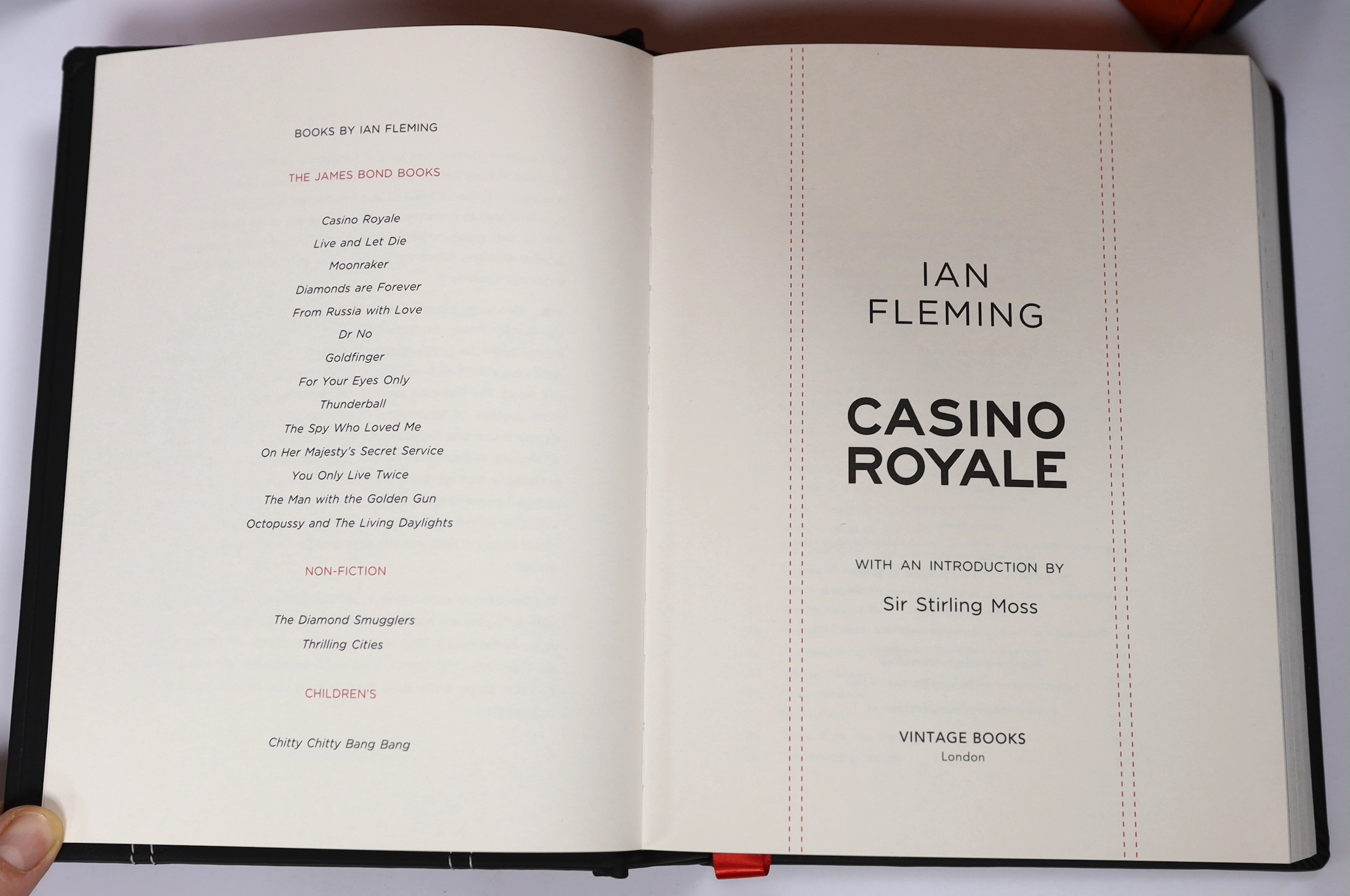 Fleming, Ian - Casino Royale, Vintage Special Series 512, by Bentley Motors Ltd., the black leather binding blind stamped with the Bentley logo, Vintage Books, London 2013, the clam shell case incorporating two sets of b